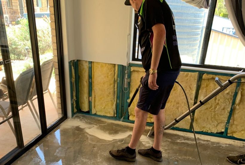 Man cleaning the floor — Restore All QLD In Kingaroy, QLD