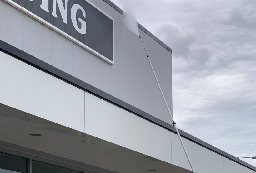 Washing the company sign with graffiti— Restore All QLD In Kingaroy, QLD